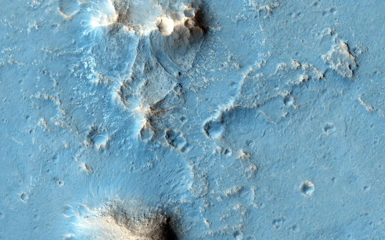 Oxia Planum is broad clay-bearing surface between Mawrth and Ares Vallis that has been proposed as a future landing site on Mars. This image is from NASA Mars Reconnaissance Orbiter.